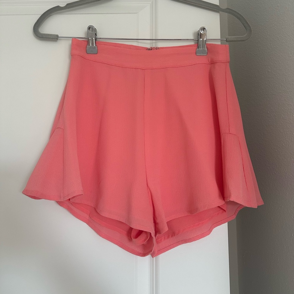 Coral colored flutter shorts